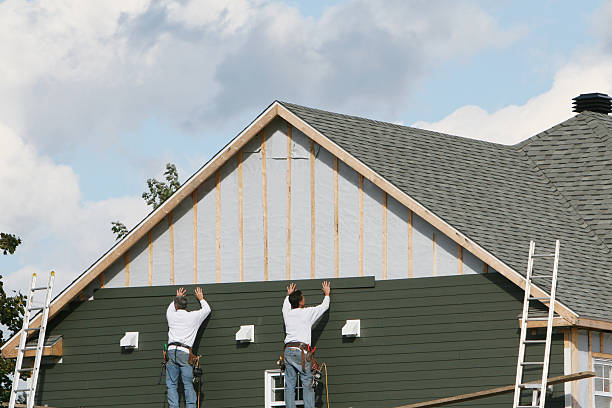 Professional Storm Damage Siding Repair technician working in Lawn, PA